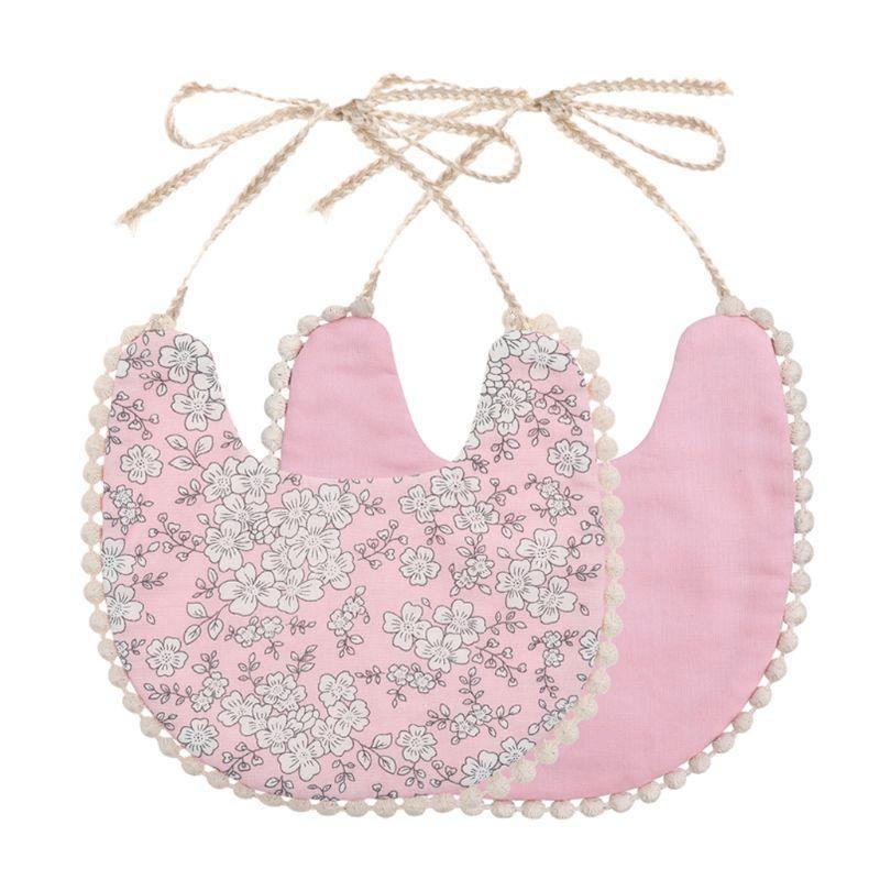 Infant bib set with tassel ties, double-sided pink floral print and solid pink reverse
