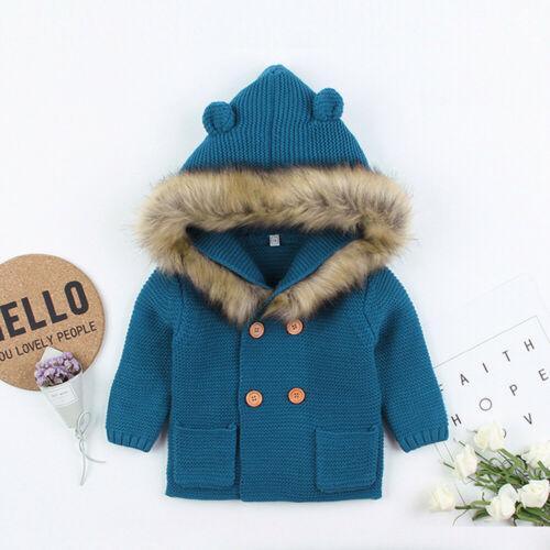 Blue newborn knit hooded coat with faux fur collar and button front