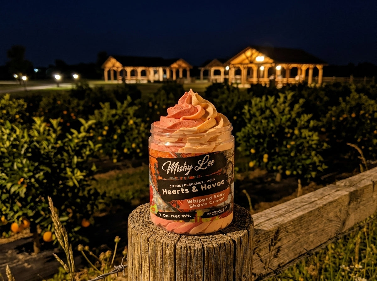 Whipped soap and shave cream jar on wood stump at night with garden background, Hearts & Havoc
