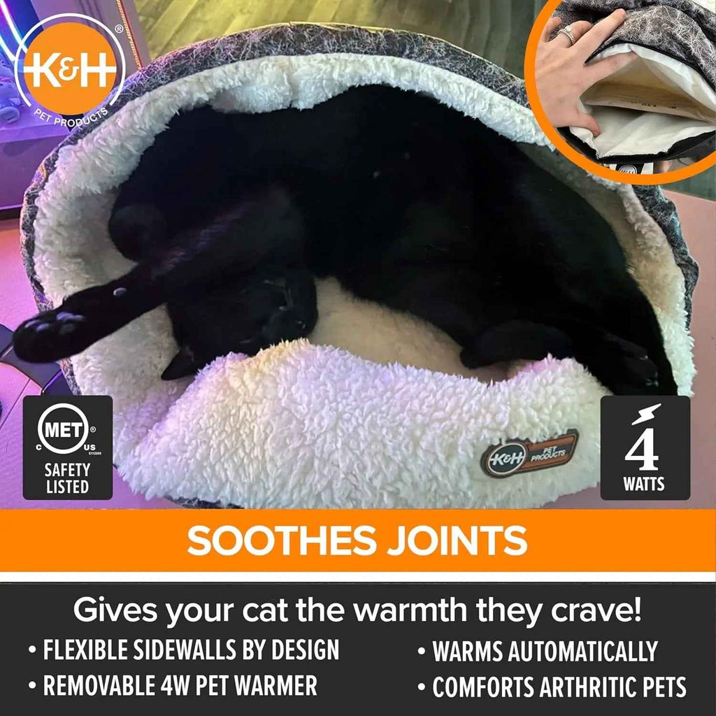 Heated cat bed with a flexible plush rim and removable warmer pad