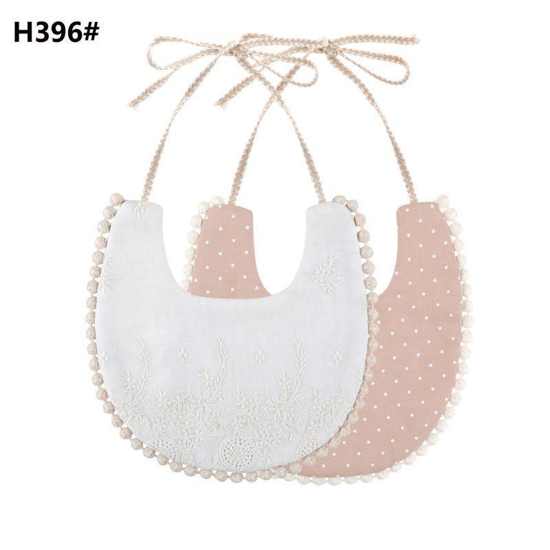 Baby bib set with tassel ties, double-sided, white and blush polka dots, pom-trim edge