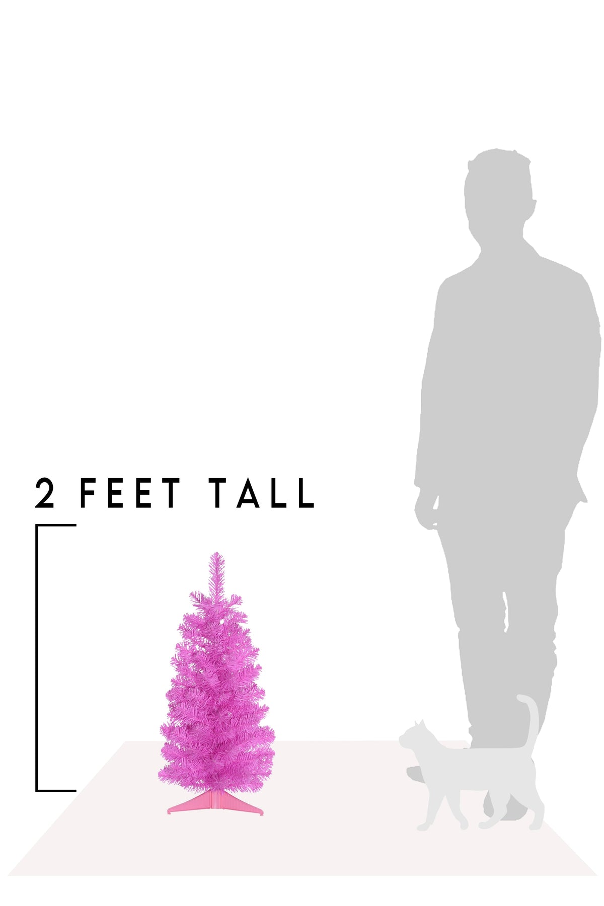 Pink tabletop Christmas tree with size scale showing two feet tall