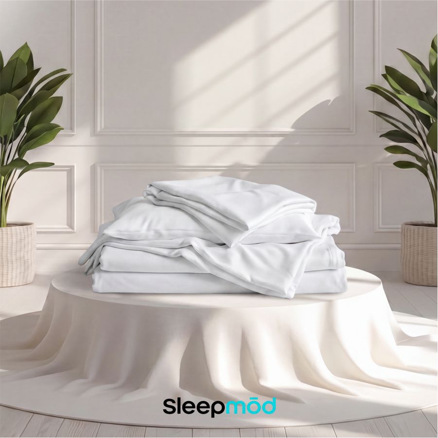 Eucalyptus Tencel sheet set, folded white sheets with smooth drape.