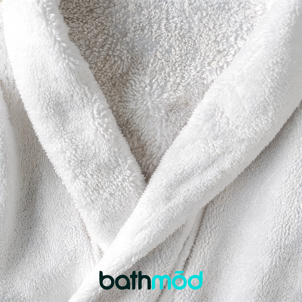 White bathrobe close-up of plush terry fabric and shawl collar