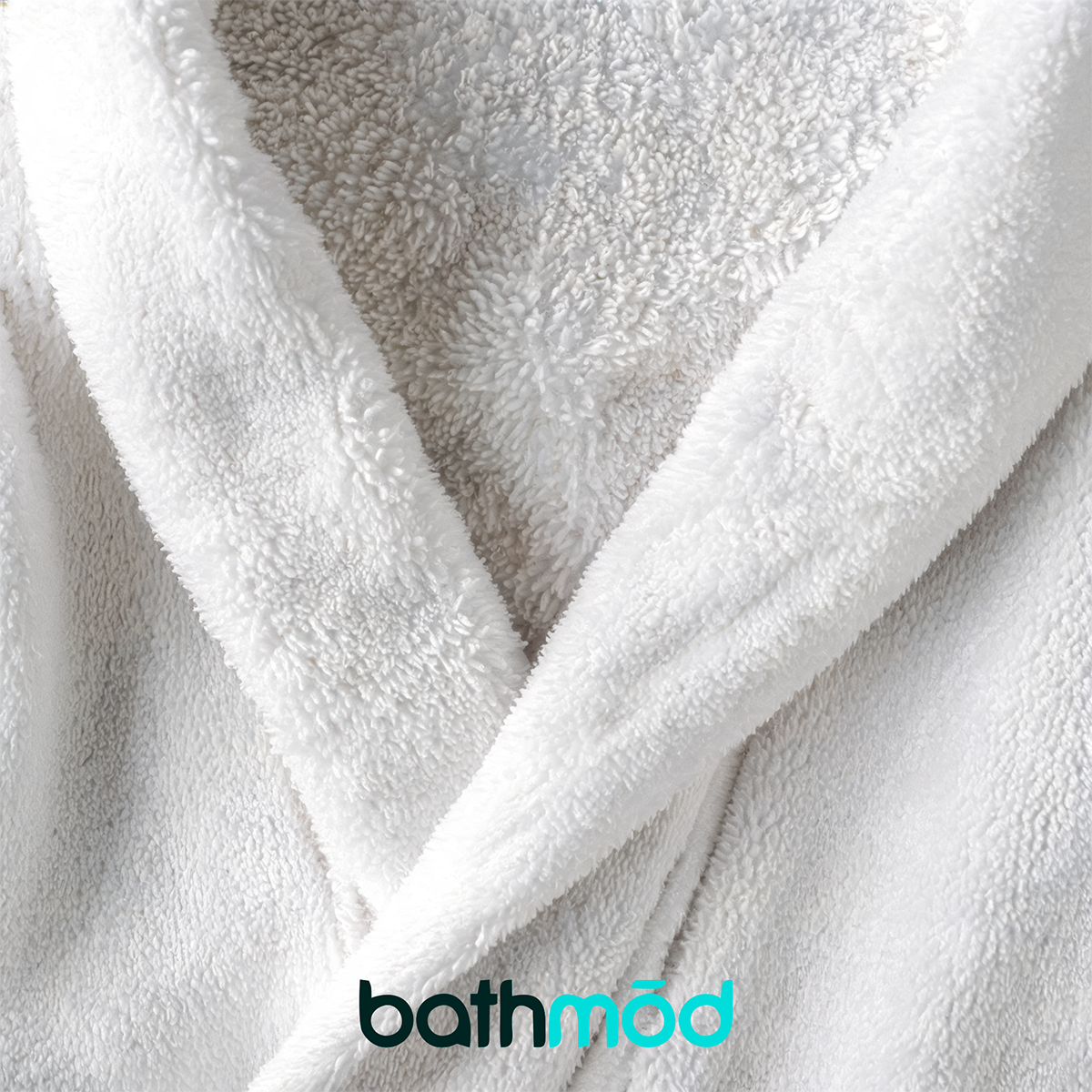 White bathrobe close-up of plush terry fabric and shawl collar