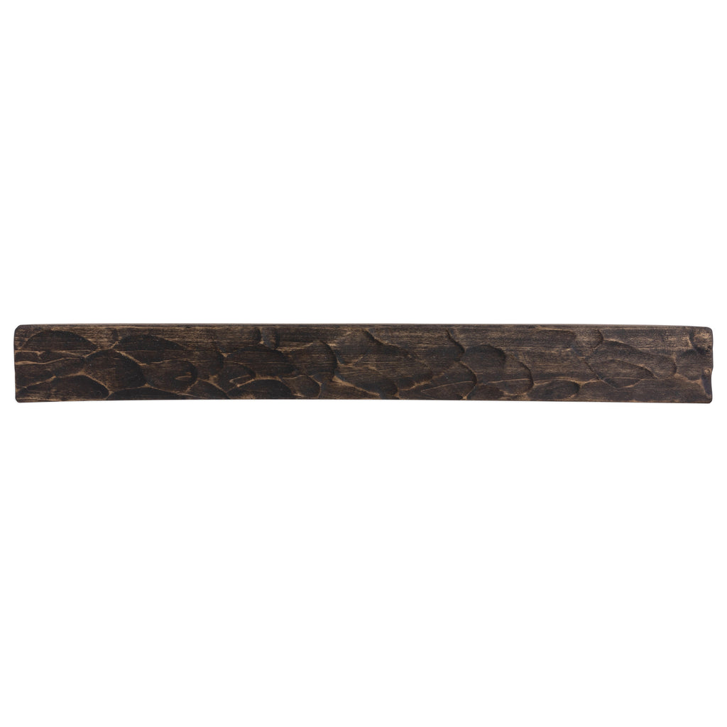 Dark wood fireplace mantel shelf with rough-hewn top surface and rounded edge