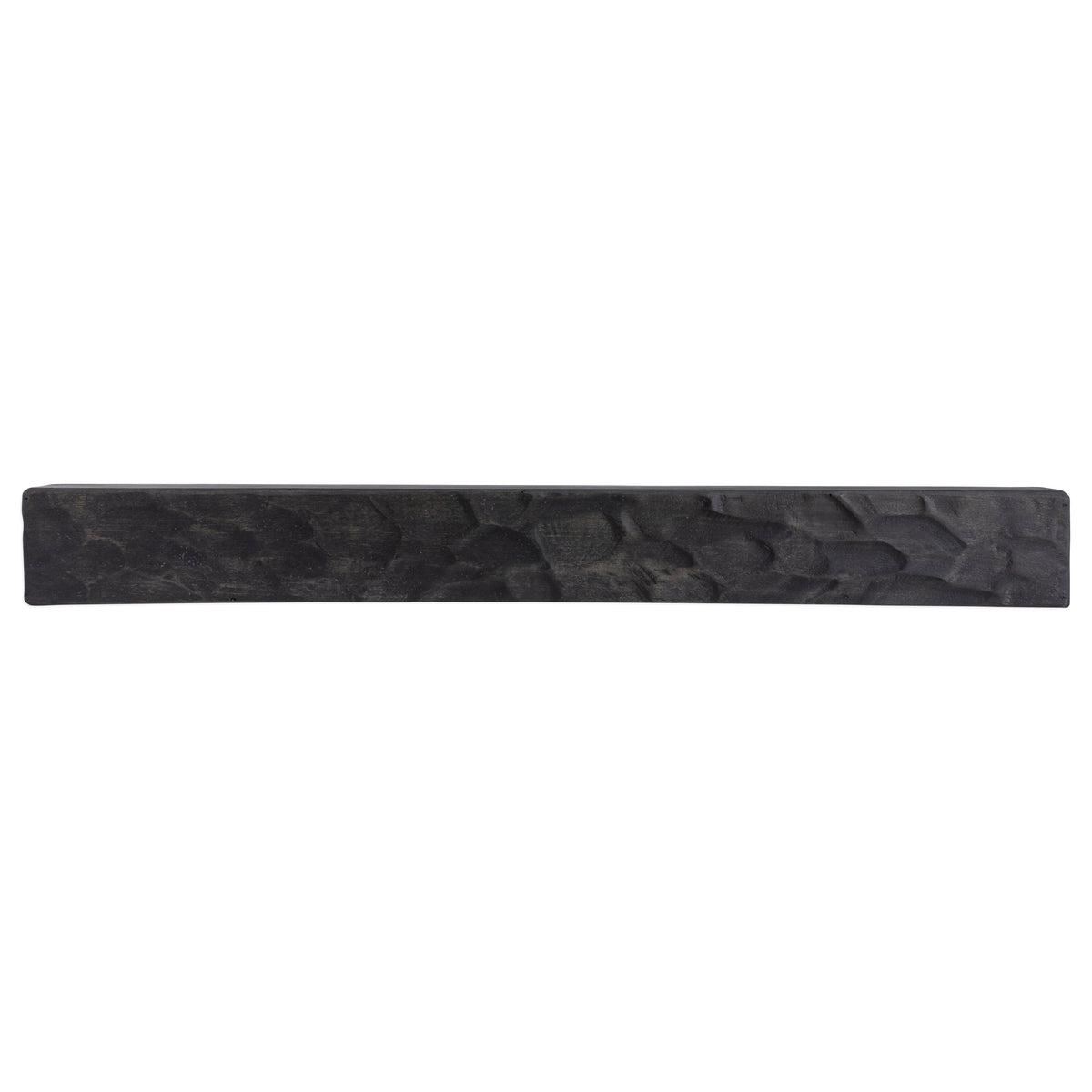 Rough-hewn wood fireplace mantel shelf in dark gray with carved stone-like texture
