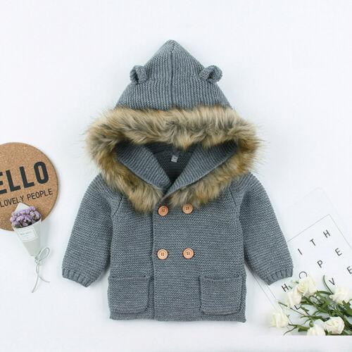 Gray newborn knit hooded coat with thick faux fur collar and button front