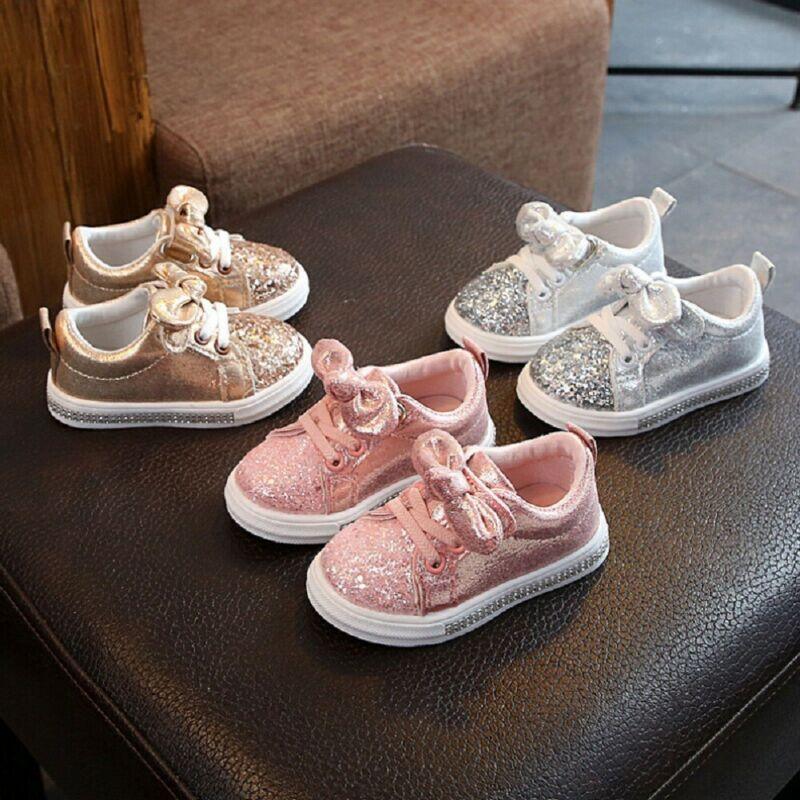 Kids glitter sneakers set with bow details: gold, silver, and pink, white soles.