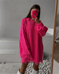 Pink long-sleeve knit sweater dress with round neck, oversized silhouette, frayed cuffs and hem