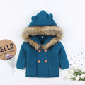 Teal blue knit hooded baby jacket with faux fur trim and button front