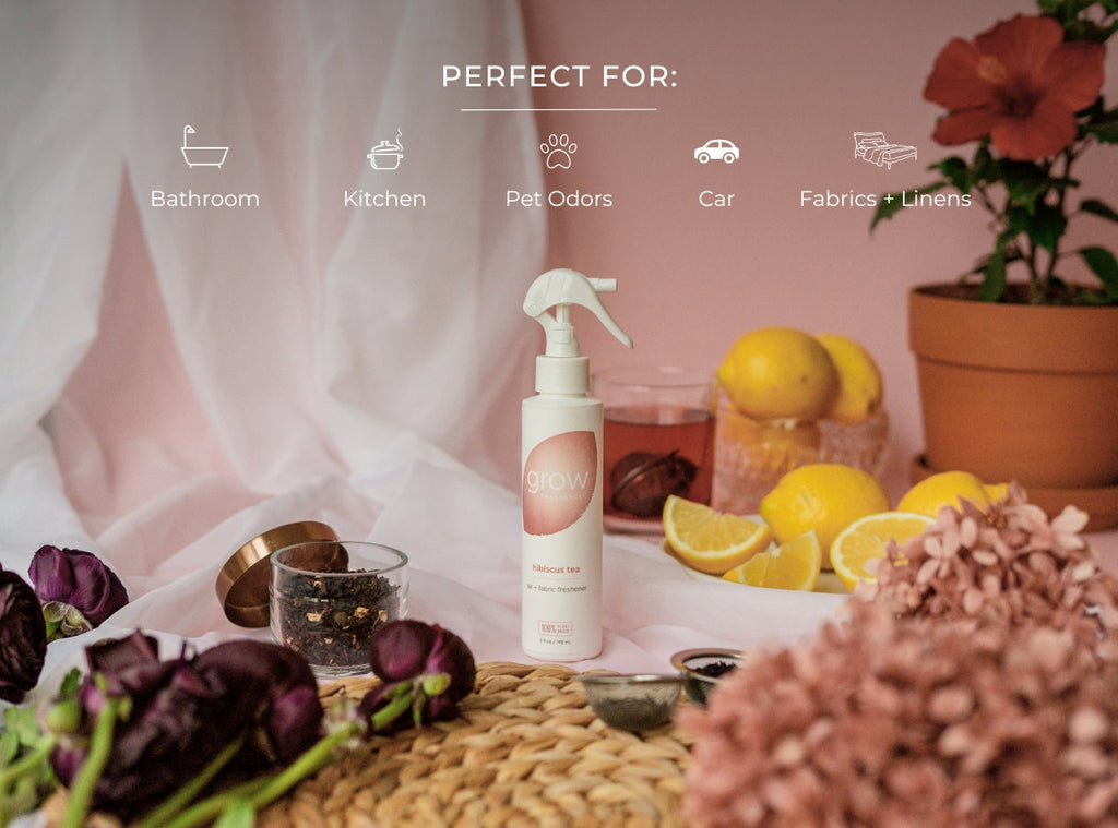 Hibiscus tea air and fabric spray bottle with white sprayer on a countertop