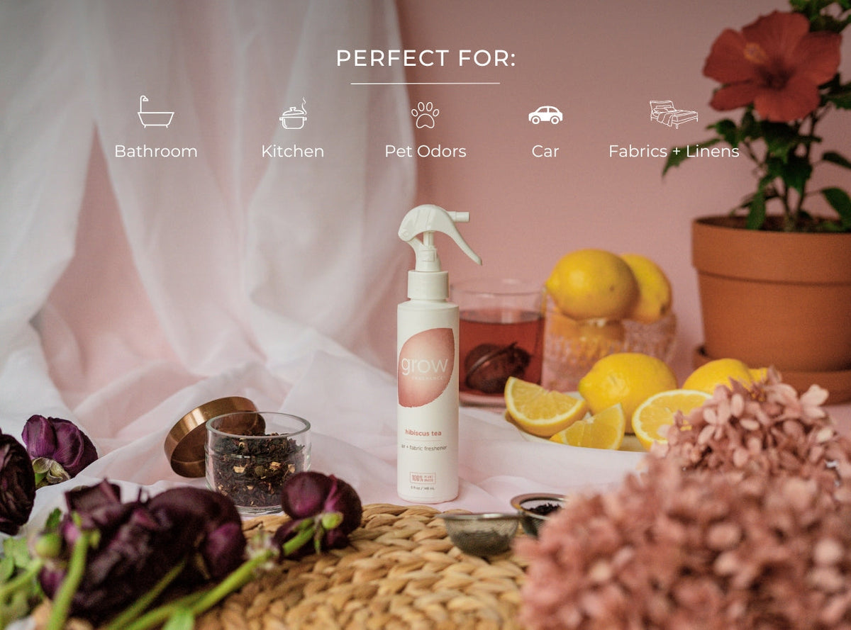 Hibiscus tea air and fabric spray bottle with white sprayer on a countertop