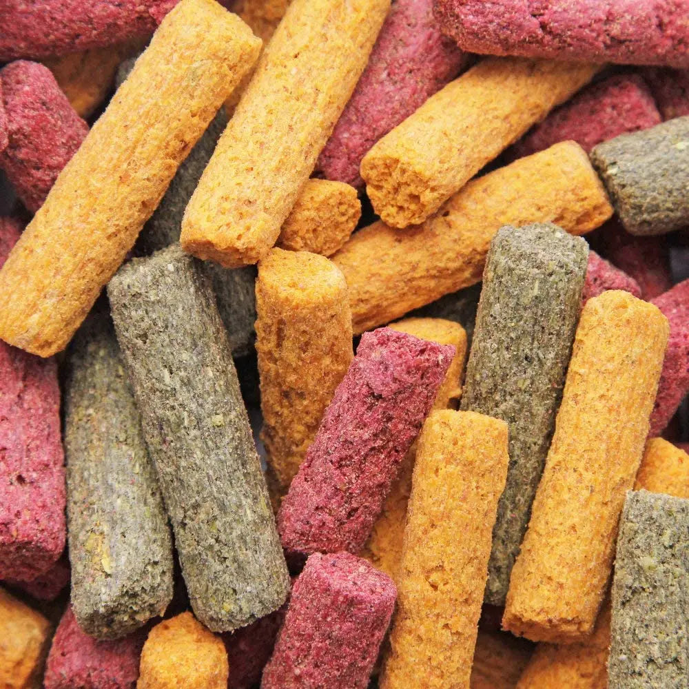 Colorful veggie stix treat sticks for small animals, mixed red, yellow, and gray