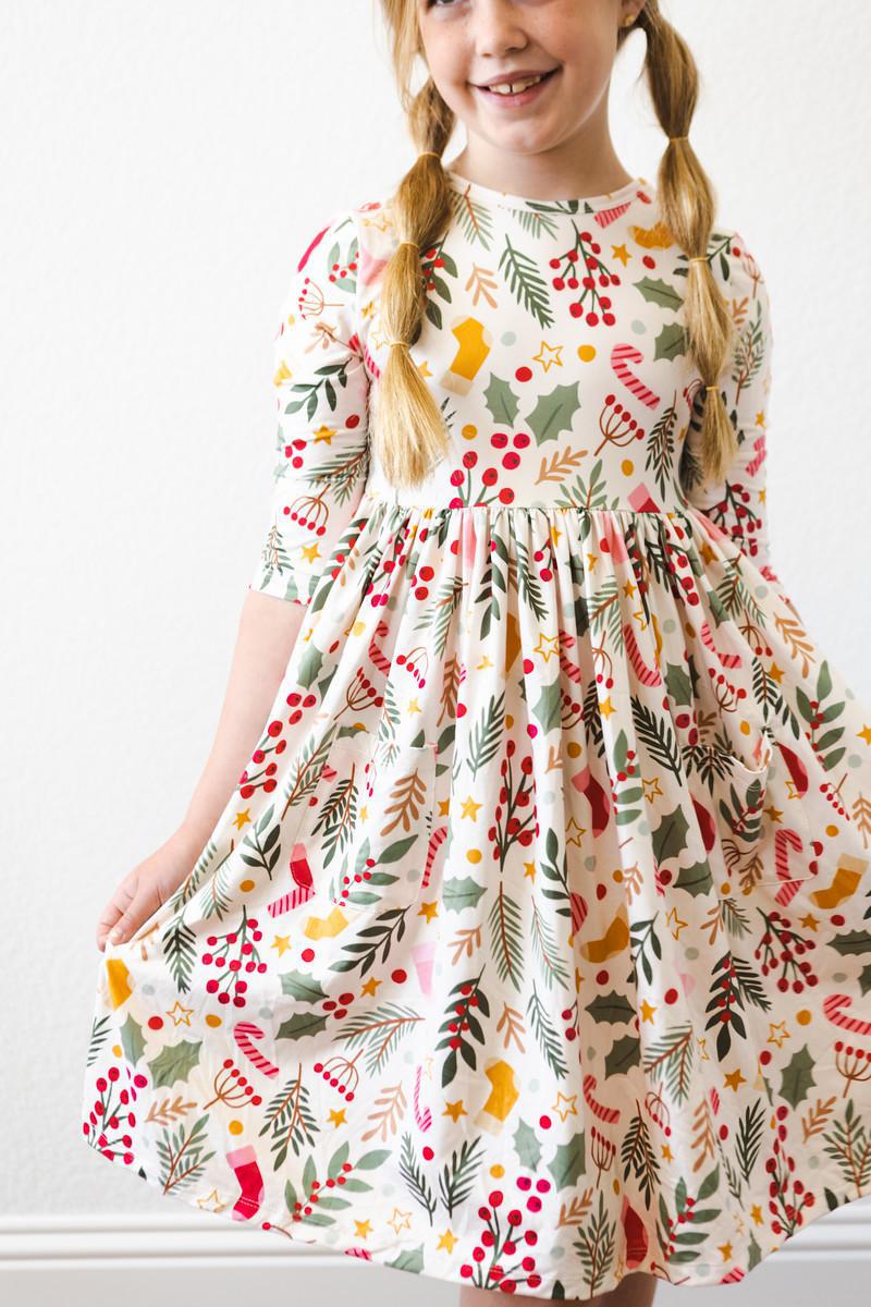 Girls’ 3/4 sleeve twirl dress with round neckline and festive holiday pattern