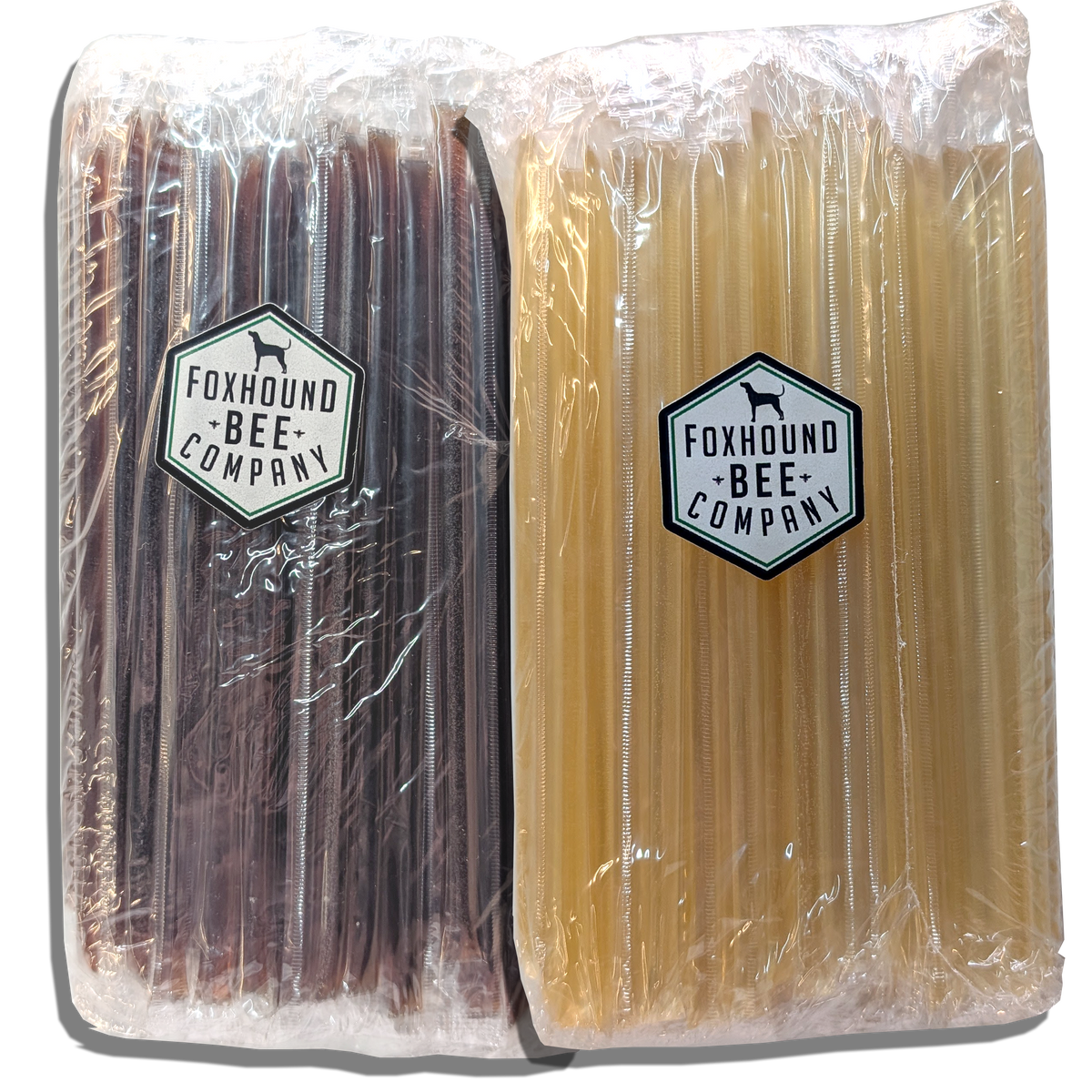 Pack of honey sticks in dark and light amber colors, sealed in clear wrap