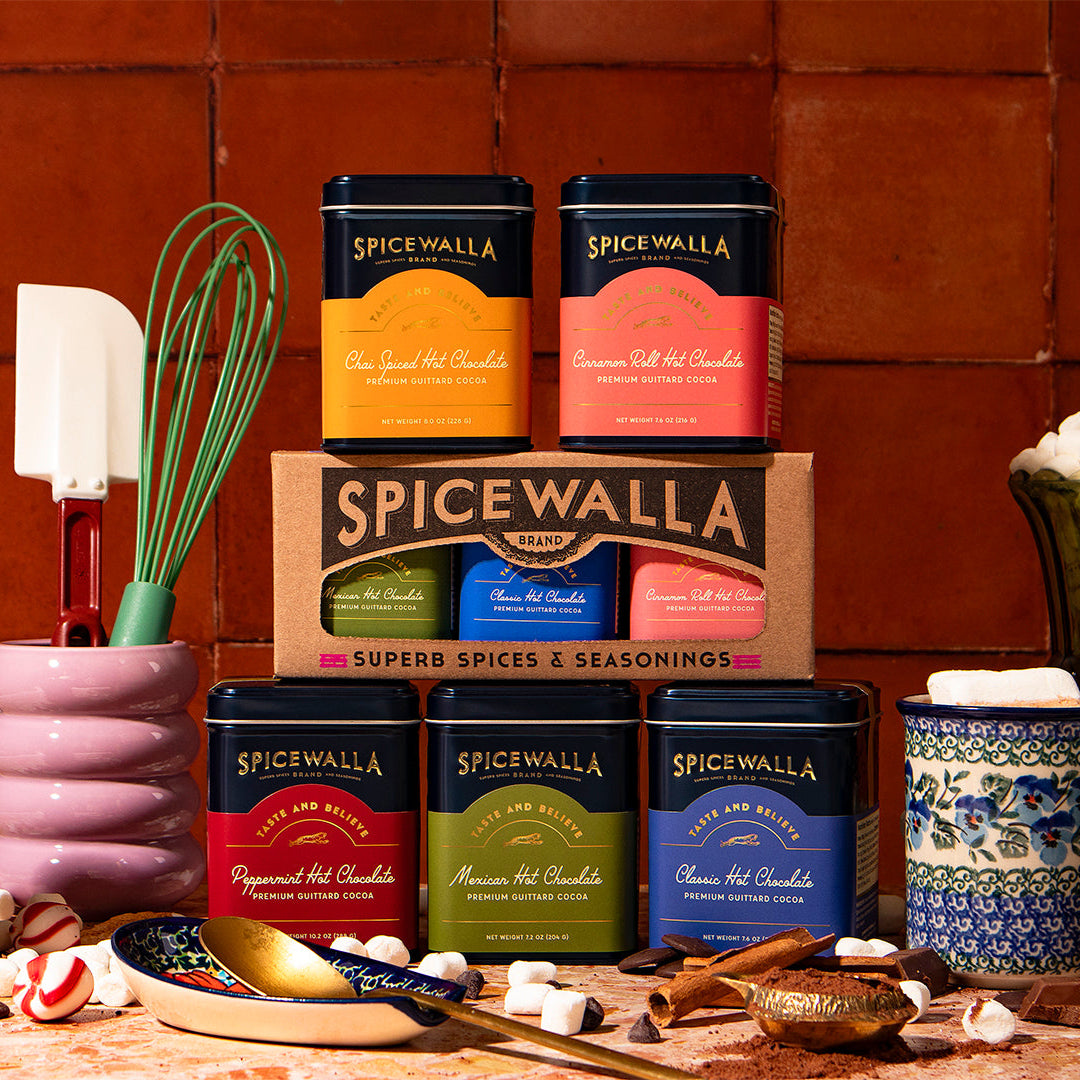 Spicewalla Peppermint Hot Chocolate Deluxe tin display with multiple labeled canisters