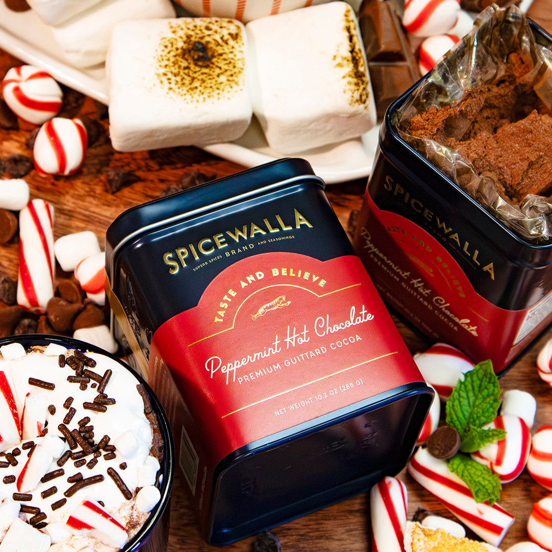 Two Spicewalla Peppermint Hot Chocolate Deluxe tins with peppermint candy pieces