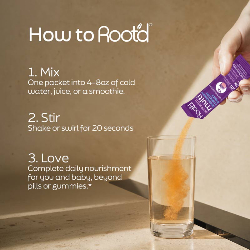 Hand dropping Root'd prenatal stick into a glass, illustrated how to mix