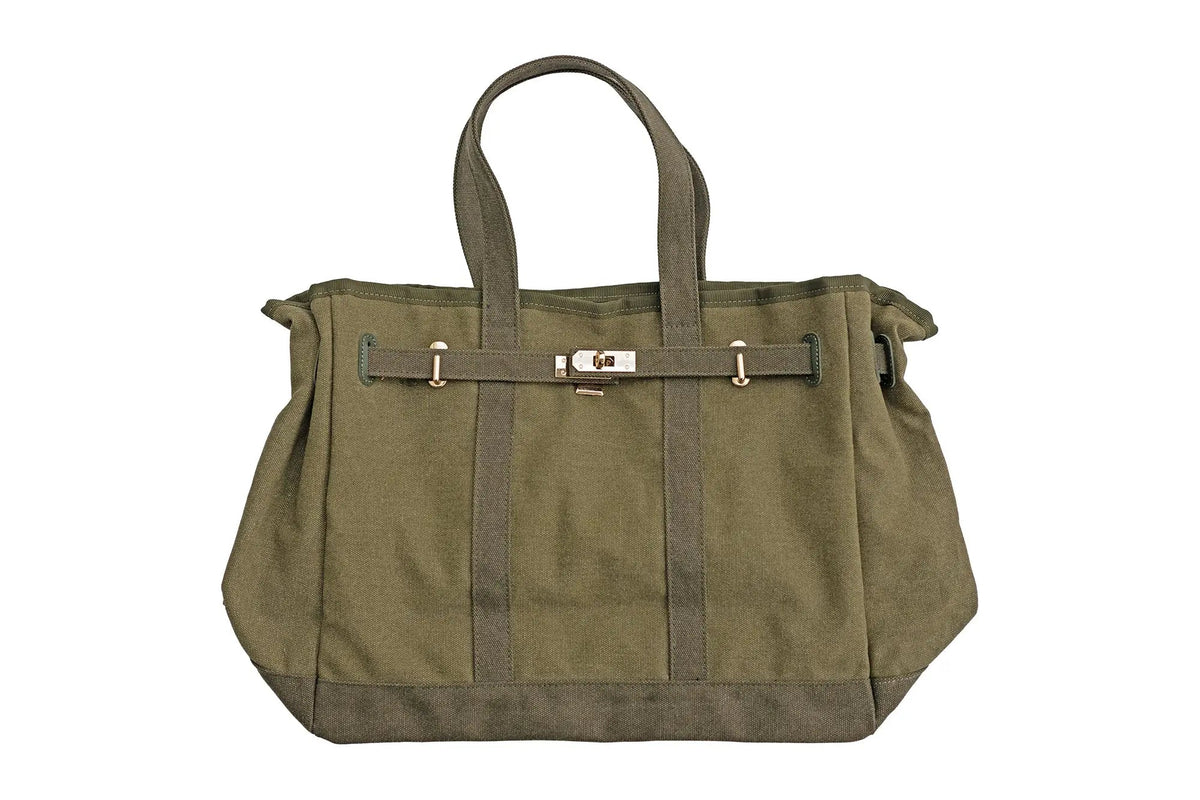 Olive canvas tote bag with belt strap, snap closure, and wide top handles