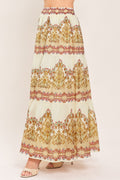 Ivory tiered maxi skirt with ornate scroll print and elastic waistband, ruffle hem
