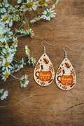 Teardrop pumpkin spice earrings with dangling hooks, brown and tan pattern and text