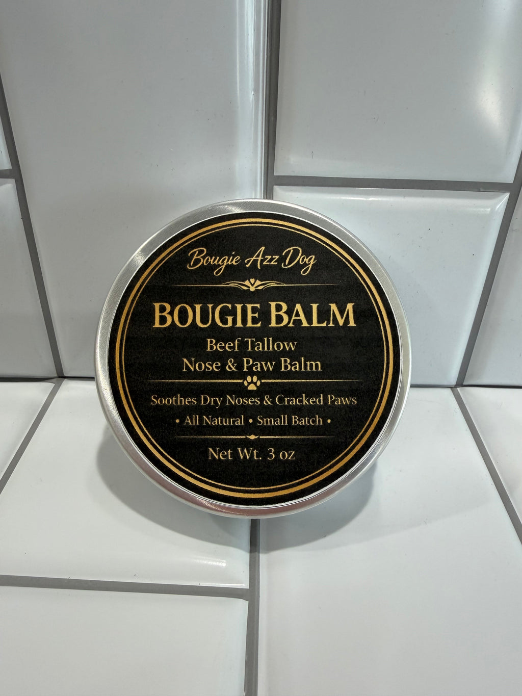 Bougie Azz Dog Bougie Balm tin with round black-and-gold label, 3 oz