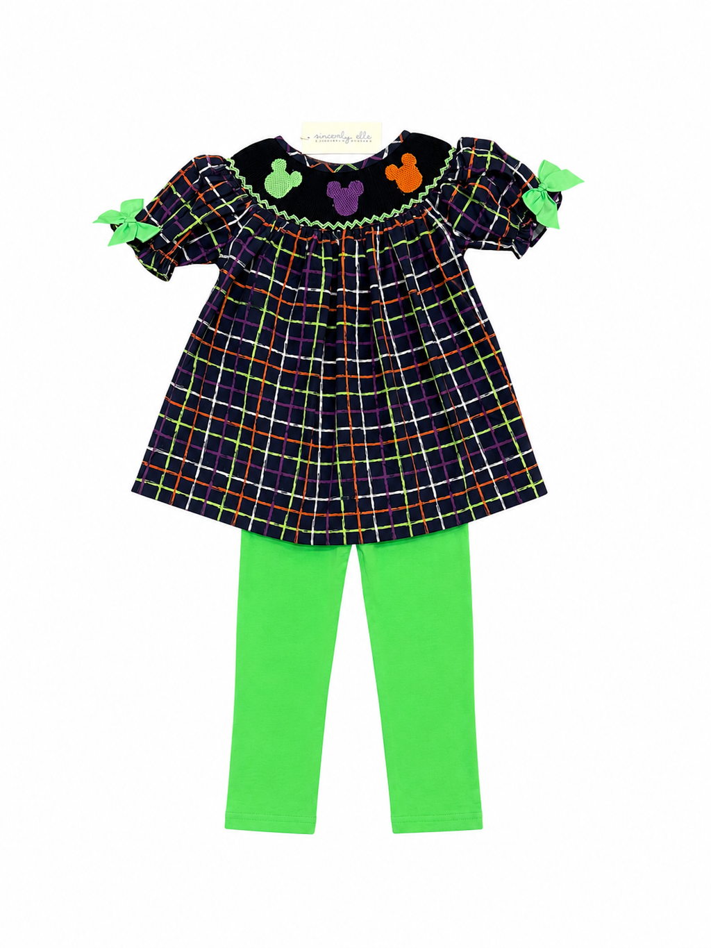 Plaid girls tunic with bat neckline, bow sleeves, and green leggings