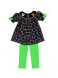 Plaid girls tunic with bat neckline, bow sleeves, and green leggings