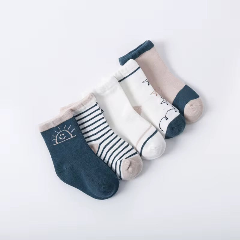 Toddler socks set with navy, striped and animal prints; beige and white accents
