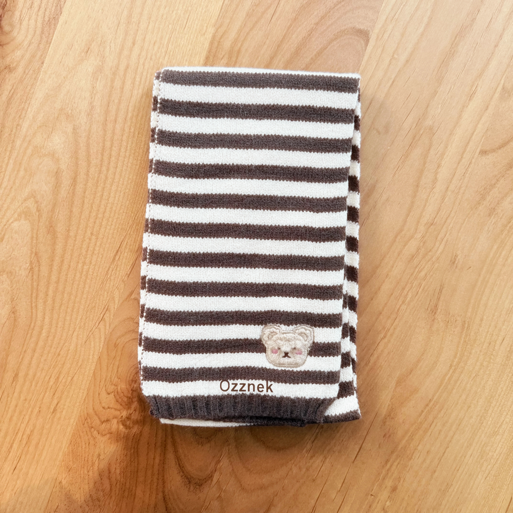 Brown-and-white striped toddler scarf with bear applique and ribbed edges