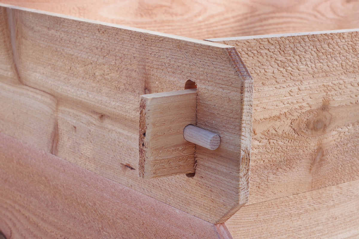 Cedar raised garden bed corner joint with wooden fastener and connector