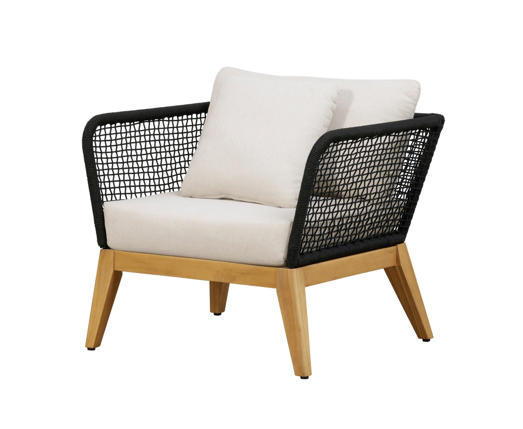 Outdoor arm chair with black woven rope back and arms, white seat cushion, teak legs