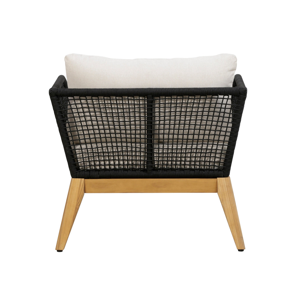 Outdoor arm chair with black woven rope back panel, single white cushion, teak legs