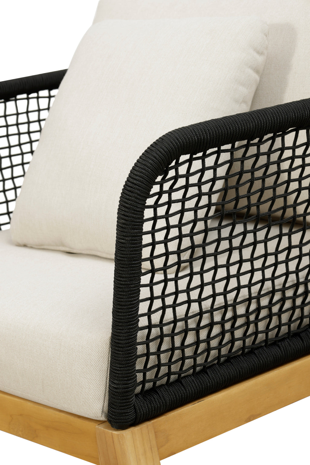 Outdoor arm chair corner with black woven rope, white cushion, and teak frame