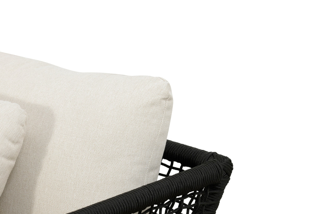 Outdoor arm chair armrest with black rope weave and beige cushion