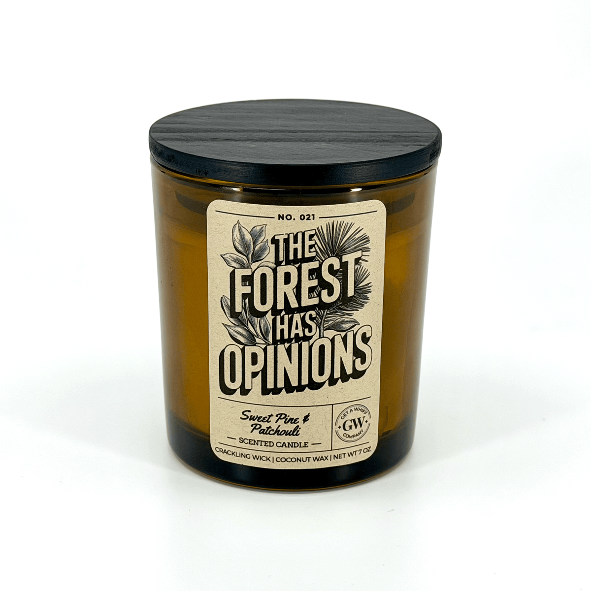 Amber scented candle jar with dark lid and “The Forest Has Opinions” label