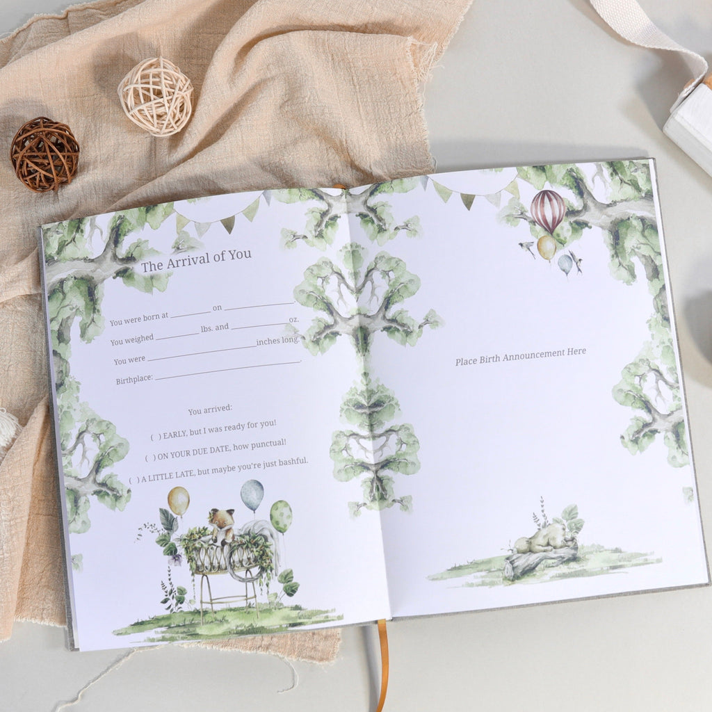 Opened baby story page with “The Arrival of You” worksheet and floral borders