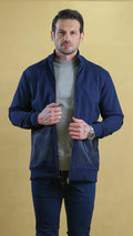 Navy quarter-panel tech sweater with quarter-zip mock neck and ribbed cuffs