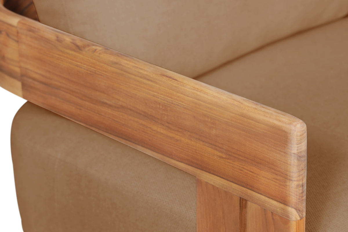 Close-up of outdoor teak wood arm on light brown fabric chair