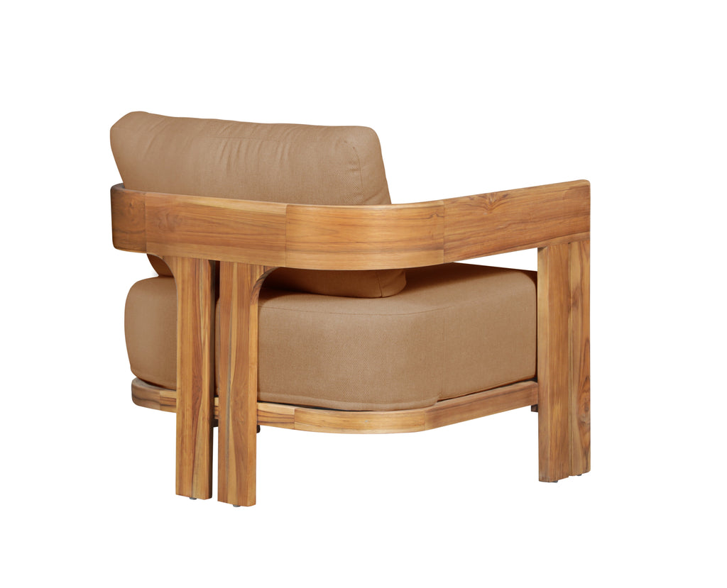 Outdoor teak wood chair with light brown cushion, angled view of arms and back