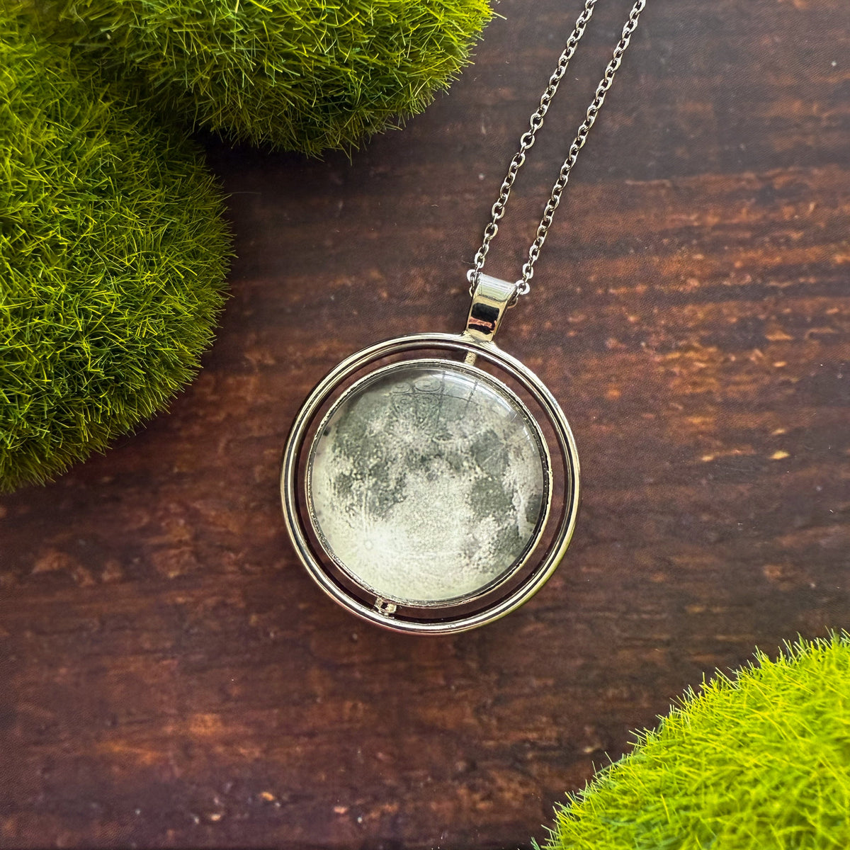 Double-sided moon fidget pendant necklace with round silver-toned glass front