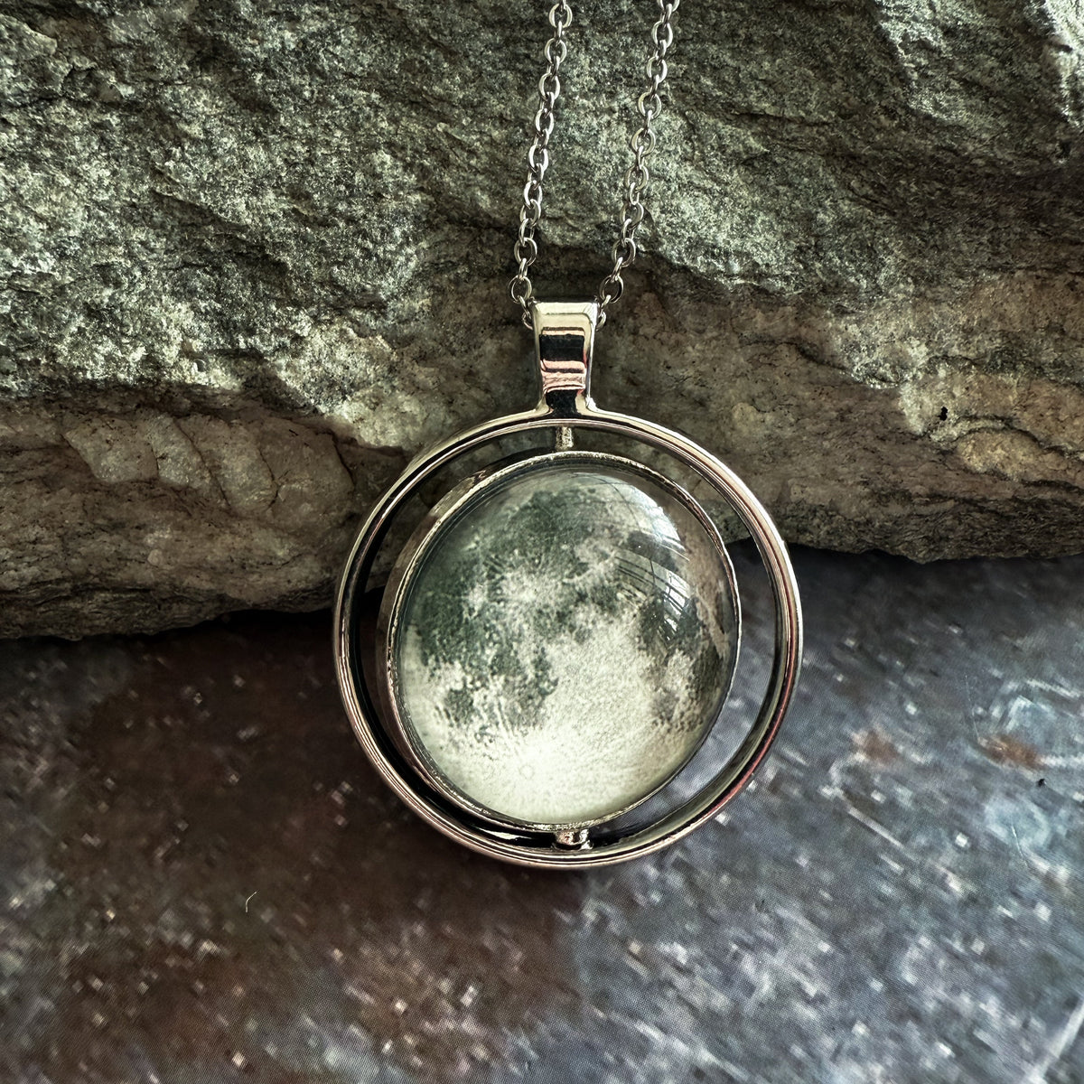 Double-sided round moon fidget pendant necklace with silver-toned chain and bail