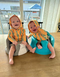 Kids UPF 50 sun hoodie in orange with cactus print and adjustable hood