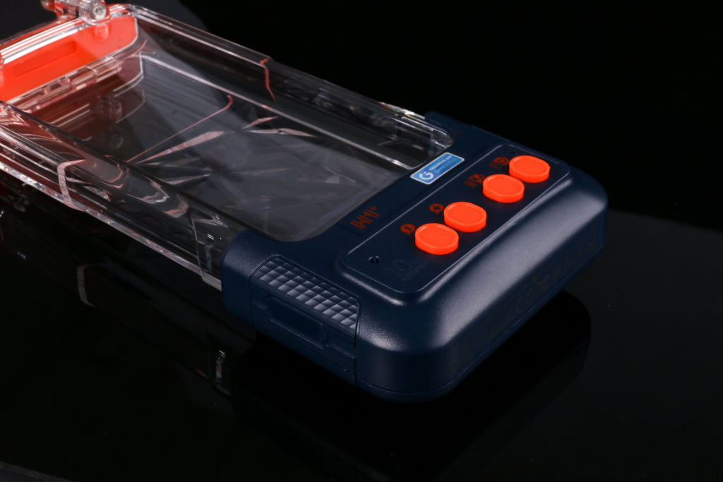 Dark blue waterproof phone case with clear lid and orange control buttons.