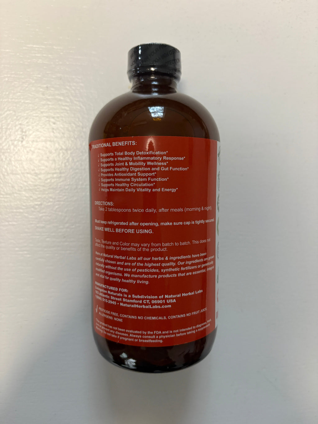 Back of amber soursop turmeric bitters bottle with ingredients and directions label