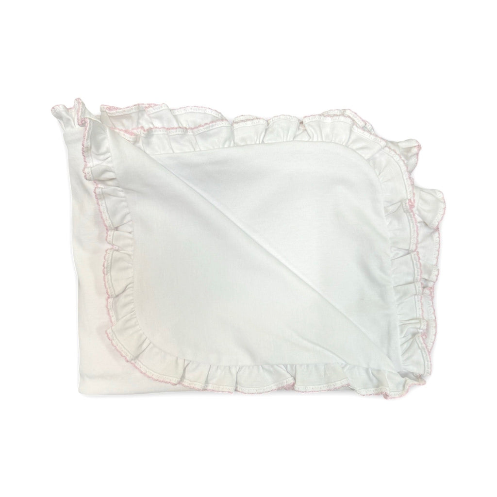 White cotton ruffle blanket with pink picot trim and scalloped edge