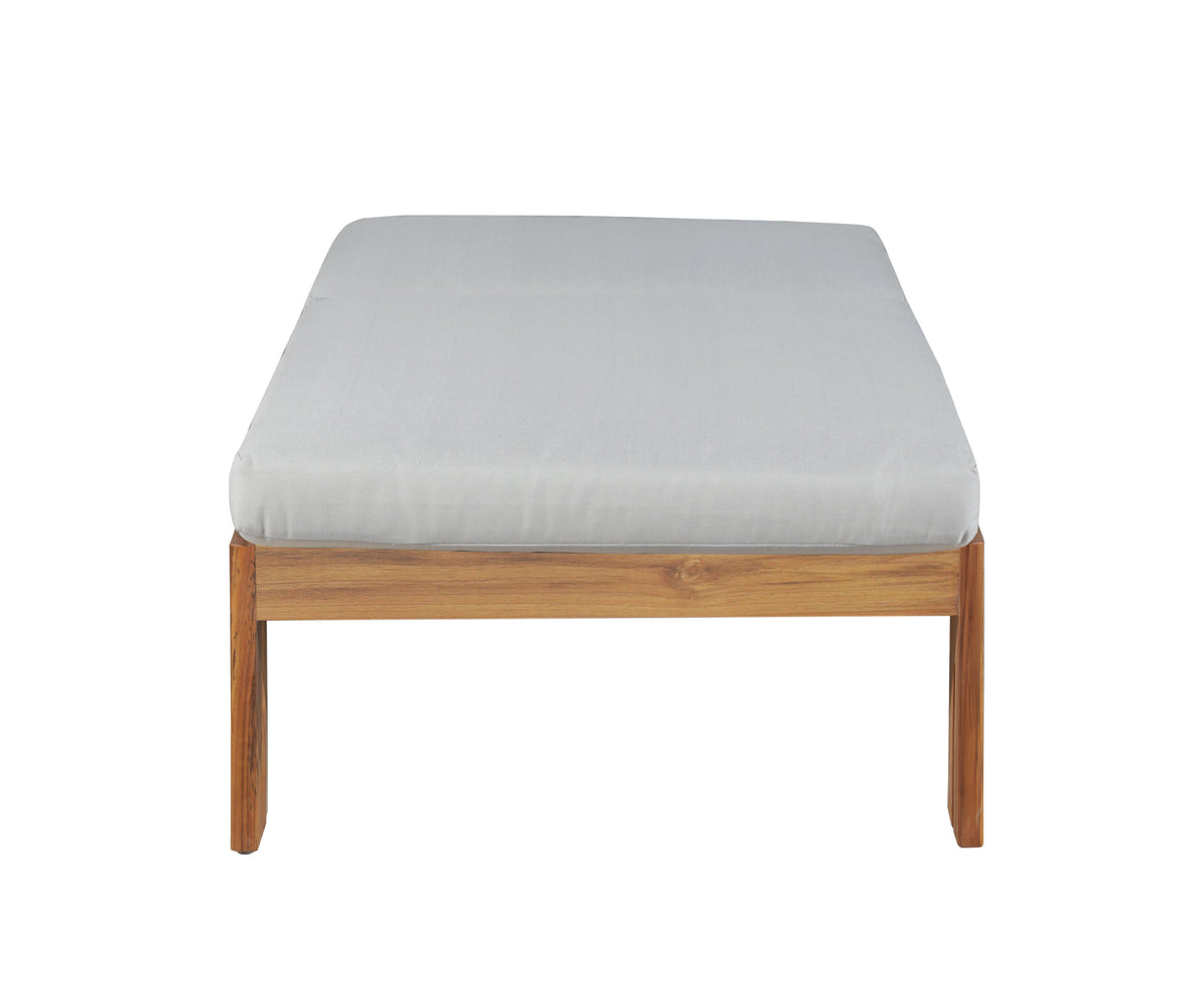 Teak outdoor chaise lounge with gray upholstered top cushion