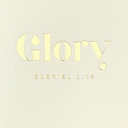 Close-up of gold 'Glory' title and 'Ezekiel 1:28' text on cream cover