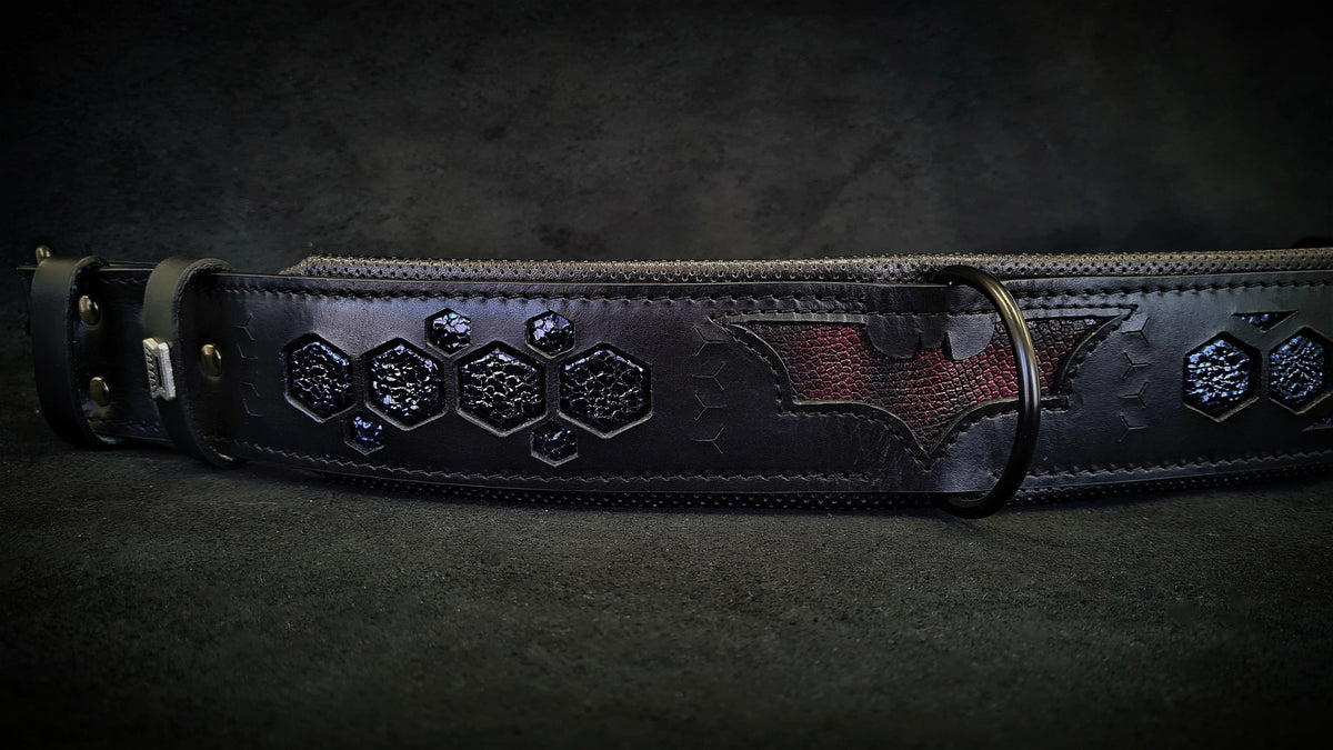 Leather dog collar with metal D-ring, dark navy, embossed hex design and bat emblem